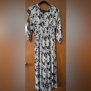 Ava Sky Black and White Floral Jumper with Green and Orange Accents